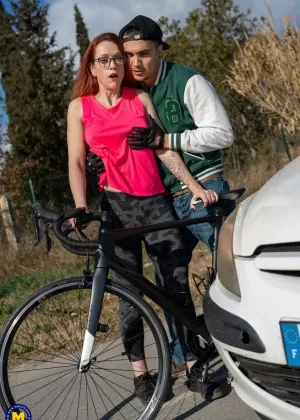 Redheaded cougar goes home with a young man for sexual relations