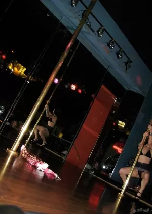 Clothed amateur milf Joanna Angel dose a sexy striptease dance