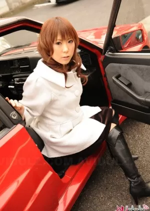 Japanese model Yuko Morita shows some leg while clothed in black boots