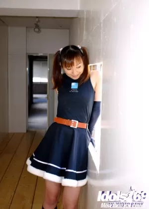 Seductive asian cheerleader uncovering her tiny tits and hairy cunt