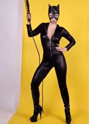 Naughty cat woman Lynn Pops pops her sexy tits out of provocative latex outfit