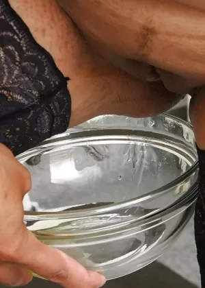 Overweight Indian woman Alice stripping down to stockings in gyno office