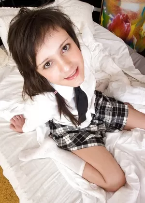 Naughty schoolgirl Milana spreading her legs and gets her ass banged