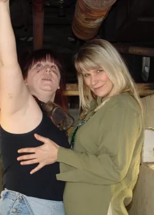 Mature lesbian Sweet Susi and her lover play with each others tits in a pit