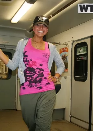 Amateur chick shows her cleavage on a subway before getting naked in a shower