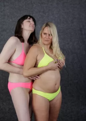 Blonde amateur Sweet Susi and her lesbian friend fondle each other in bikinis