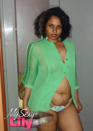 Chubby Indian woman Lily Singh sets her big natural tits free of her shirt