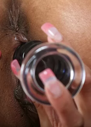 Top-heavy indian MILF pleasing her juicy twat with a ribbed dildo